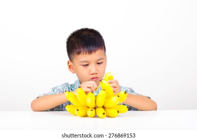 A Boy Eating Banana Fruit 