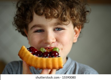 Boy Eating Fruity Pie