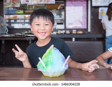 Boy Eating Rainbow Shaved Ice