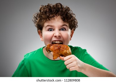 Boy Eating Roasted Chicken Leg