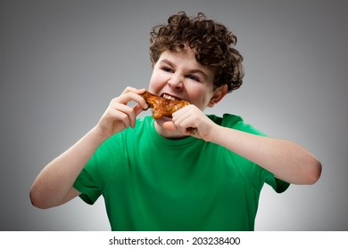 Boy Eating Roasted Chicken Leg