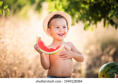 Boy eating water-melon. Funny happy child eating watermelon outdoors. Little boy eating watermelon. Kids eat fruits in the garden - Powered by Shutterstock