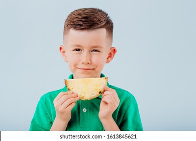 Boy Eats Pineapple Isolated On Blue Stock Photo 1613845621 | Shutterstock