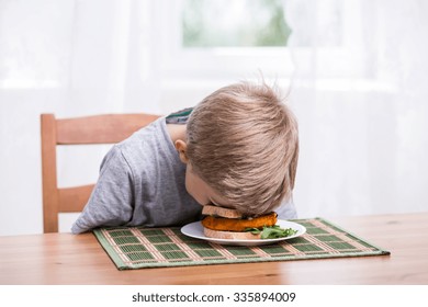 Boy Falling Asleep And Landing Face In Food