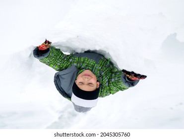 Boy Fell Into Snow Up To His Chest, Top View