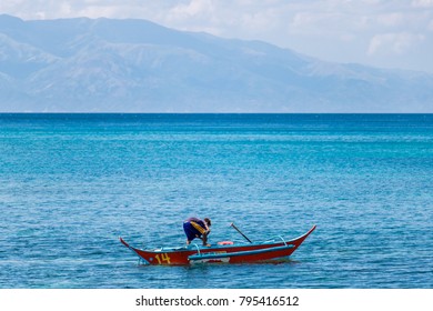 Boy Fishing Alone