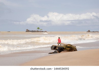 A Boy From The Fishing Village Of Axim Who, In His Spare Time, Enjoys The Sea In Ghana And Shows The Possetive Side Of West Africa. Picture Taken In Axim Ghana 2018 November 1.