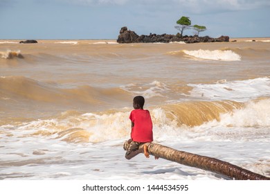 A Boy From The Fishing Village Of Axim Who, In His Spare Time, Enjoys The Sea In Ghana And Shows The Possetive Side Of West Africa. Picture Taken In Axim Ghana 2018 November 1.