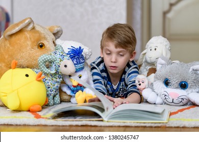 
The boy is five years old playing toys.
