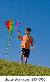 Boy Flying A Kite