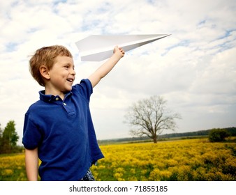 Boy Flying A Paper Airplane