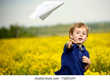 Boy Flying A Paper Airplane