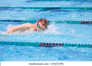 Boy In A Freestyle Swim Race