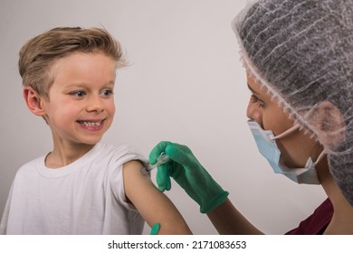 Boy Getting Flu Shot. Cropped Nurse Giving Child Intramuscular A