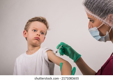 Boy Getting Flu Shot. Cropped Nurse Giving Child Intramuscular A