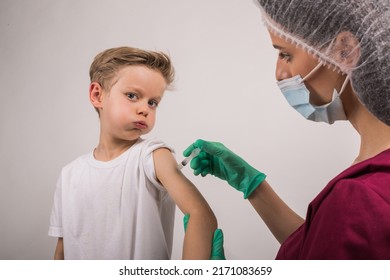 Boy Getting Flu Shot. Cropped Nurse Giving Child Intramuscular A