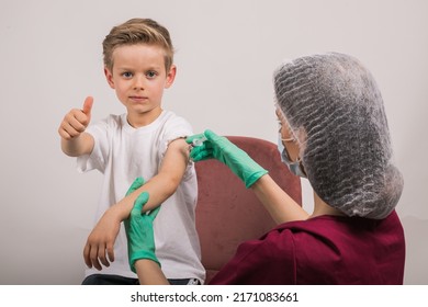 Boy Getting Flu Shot. Cropped Nurse Giving Child Intramuscular A