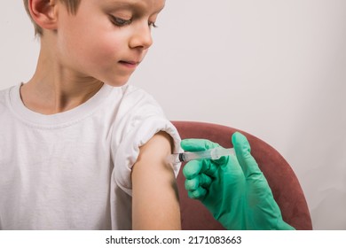 Boy Getting Flu Shot. Cropped Nurse Giving Child Intramuscular A