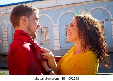 Boy and girl during walk in a city in a summer day
