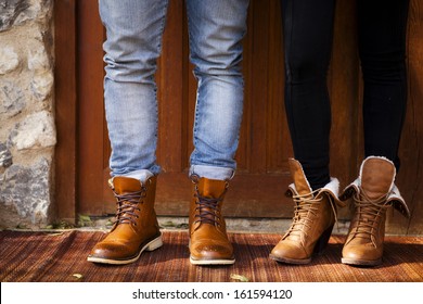 Boy And Girl With Fashion Leather Boots