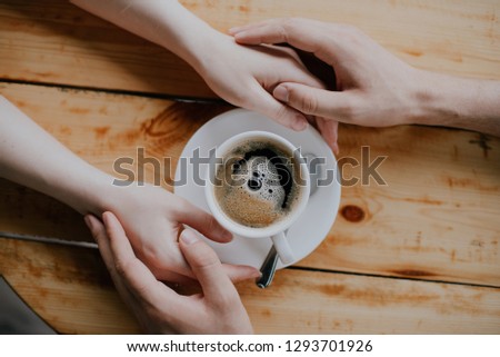 boy and girl hold hands