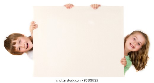 Boy And Girl Are Holding Empty  Board On White