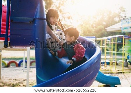 boy and girl on the playground