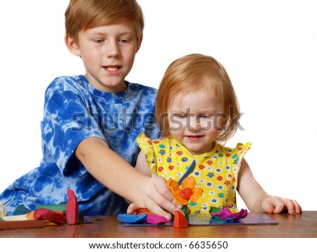 boy and girl with plasticine