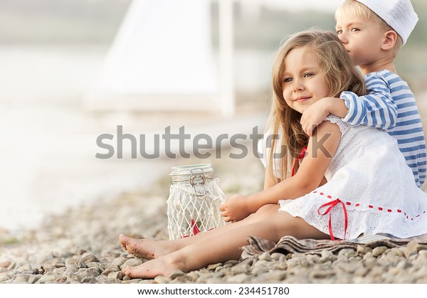 Boy Girl Sitting On Beach Binoculars Stock Photo 234451780 | Shutterstock