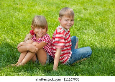 Boy Girl Sitting Together On Grass Stock Photo 111167933 | Shutterstock