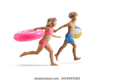 Boy and girl in swimwear running and carrying a pink rubber swimming ring and a beach ball isolated on white background - Powered by Shutterstock