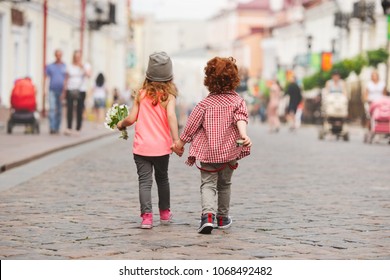 boy and girl walking on the street