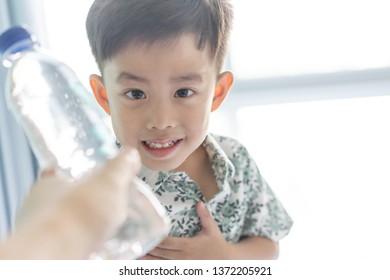 Boy Giving Bottle Water Fridge His Stock Photo 1372205921 | Shutterstock