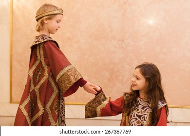 Boy Giving Girl Hand During Theater Play 