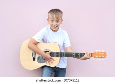 boy guitar music fun