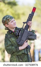 Boy With A Gun Playing Lazer Tag