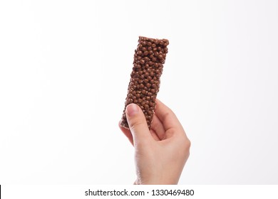 Boy Hand Holding A Chocolate Cereal Bar