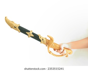 boy hand holding plastic toy sword isolated white background - Powered by Shutterstock