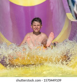 Boy Having Fun On Water Slide Stock Photo 1570449109 | Shutterstock