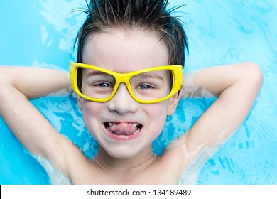 The Boy Having Fun At The Water Park