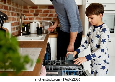  Boy helping with the dishwasher                               - Powered by Shutterstock