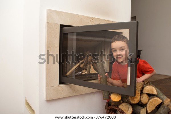 Boy Helping Home Lighting Fire Fireplace Stock Photo Edit Now