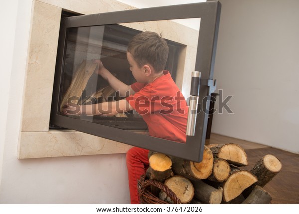Boy Helping Home Lighting Fire Fireplace Stock Image Download Now