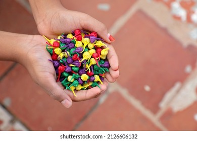 Boy Holding Bang Snaps Or Pop Pops Magical Tricks Crackers	
