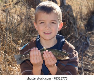 Boy Holding Fish Caught Fly Fishing - Rainbow Trout