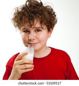 Boy Holding Glass Of Milk