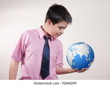 Boy Holding A Globe In His Hand