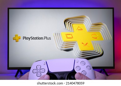 Boy Holding Playstation 5 Controller With Playstation Plus On Screen. 29 Mar, Sao Paulo, Brazil.