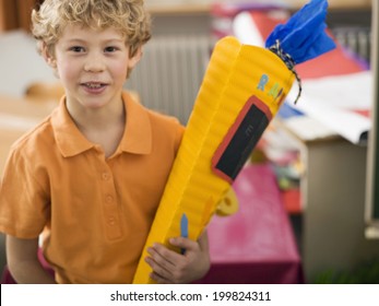 Boy Holding School Cone