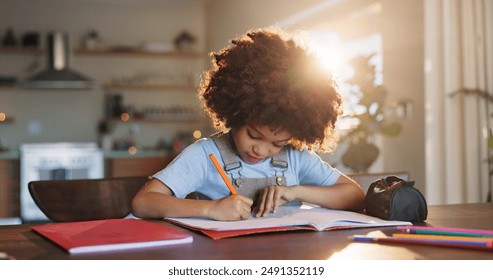 Boy, home and writing homework on table in house, education and school work with kid or notebook. Child development, growth and studying for test or exam, apartment and academic knowledge with pen - Powered by Shutterstock